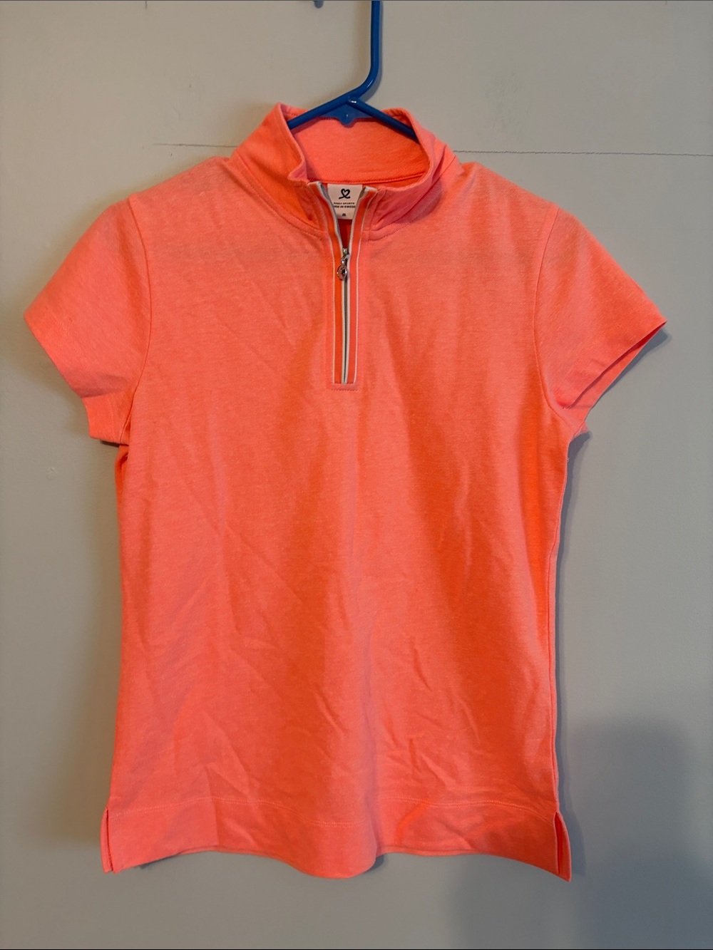 Daily Sports ladies Zip Mock Neck Short Sleeve Top - Neon Coral. Med.